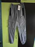 Pantaloni gri  Nike Air Max ORIGINAL / mărimea XS, nou cu etichetă