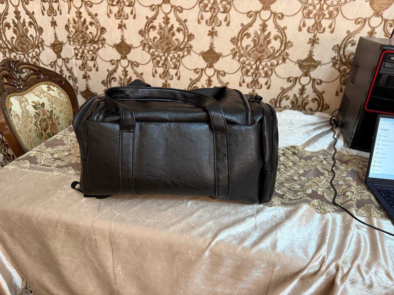 Дорожная кожаная сумка