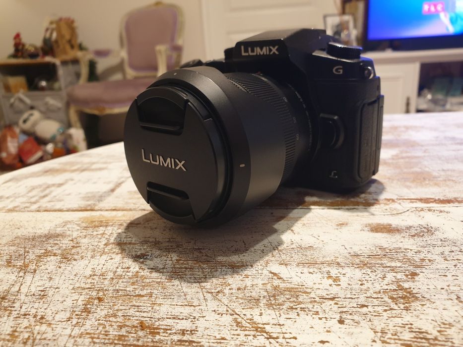 Panasonic 12-60 aproape ca nou