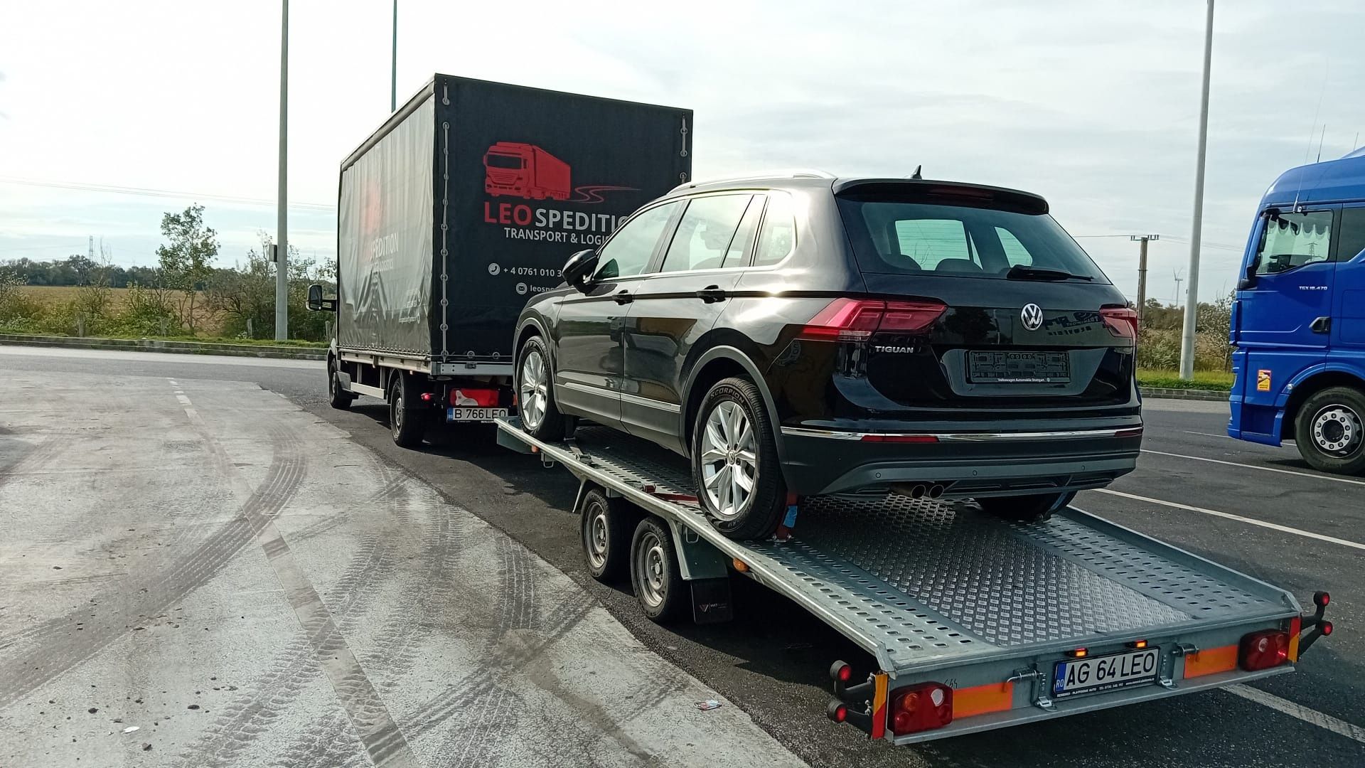 Transport auto pe platforma SLEP si colete Germania Belgia FR- ROMANIA