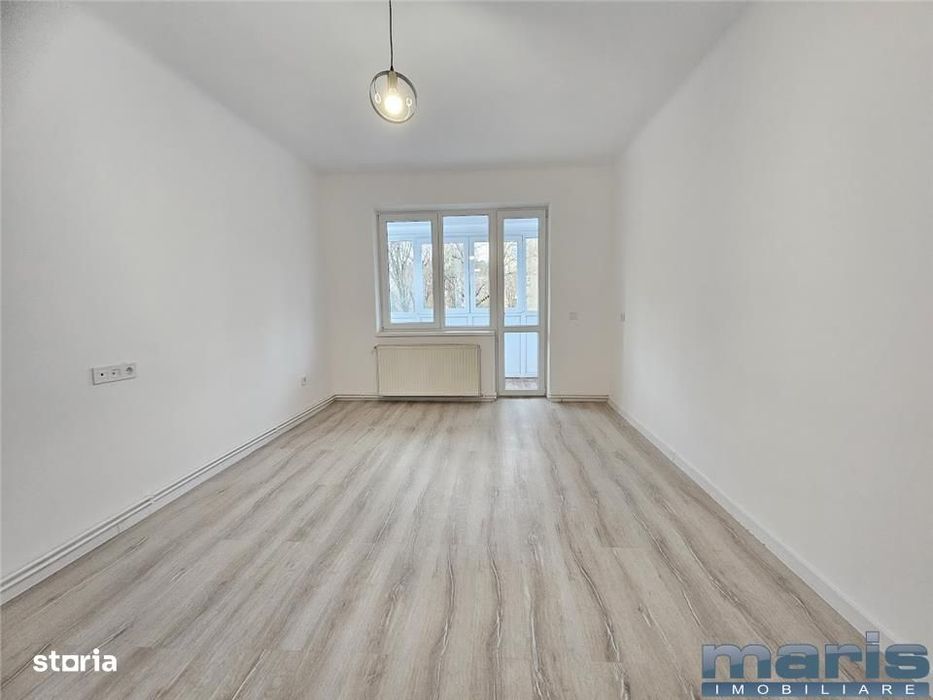 Apartament 3 camere etaj 2 zona 22 Dec. - UMFST