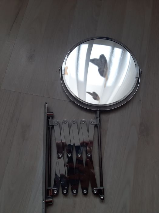 Oglinda pliabila cu doua fete