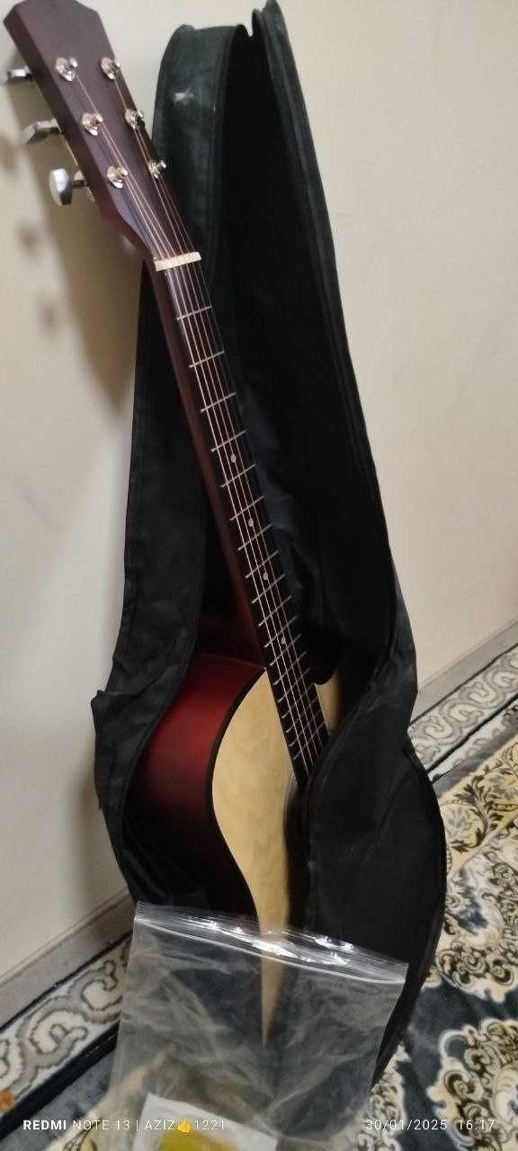 Gitara barcha anjomlari bilan