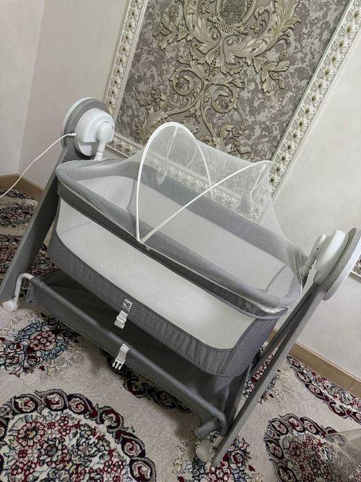 Детская кроватка качалка