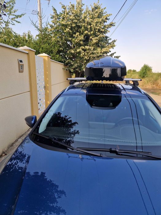 Inchiriez cutie portbagaj Thule Motion XT SPORT Negru Lucios