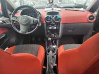Opel Corsa 2011  1.4 benzina 101 cp bord și tapițerie roșie 149300km