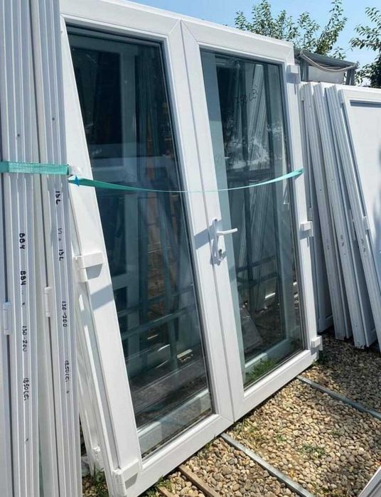 usi duble noi albe cu sticla de jos pana sus de la 1400lei