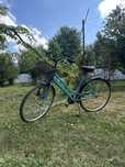 Bicicleta aproape noua