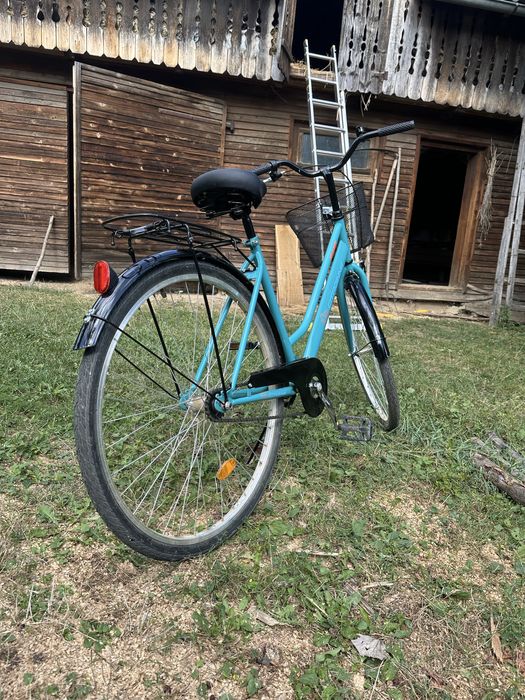 Bicicleta aproape noua