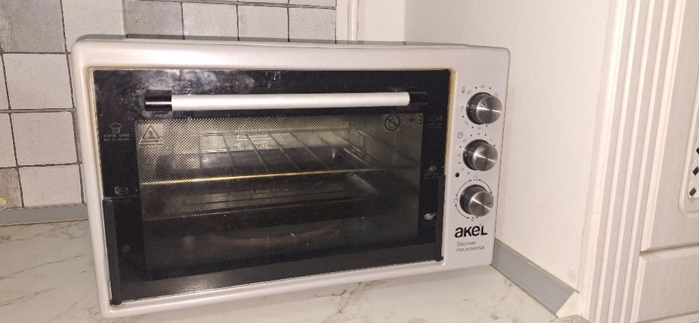 Продам печь духовку akel