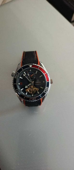 часы омега механика