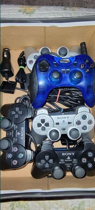 Încărcător original și accesorii PlayStation