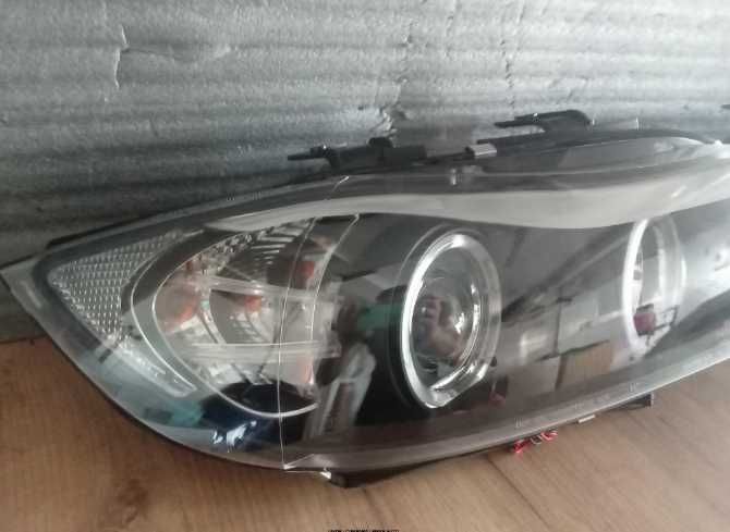 Faruri BMW E90 E91 2005-2008 ANGEL EYES fundal negru pe STOC