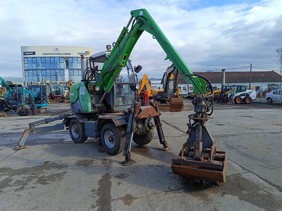 Excavator pe roți HANSA APZ 531 – 2003 – graifer hidraulic rotativ