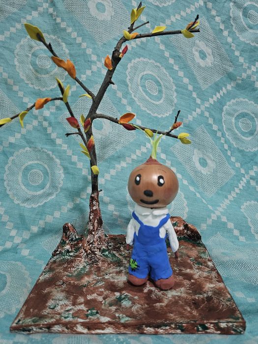 Поделка  из лука Чиполлино