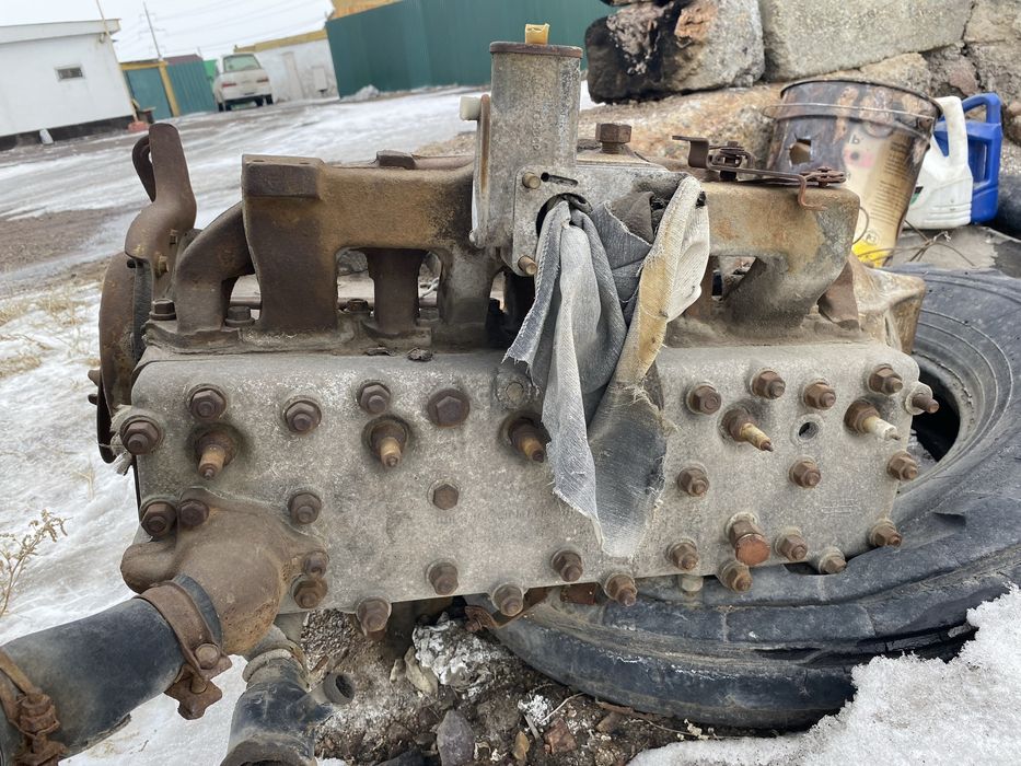 Двигатель газ 52