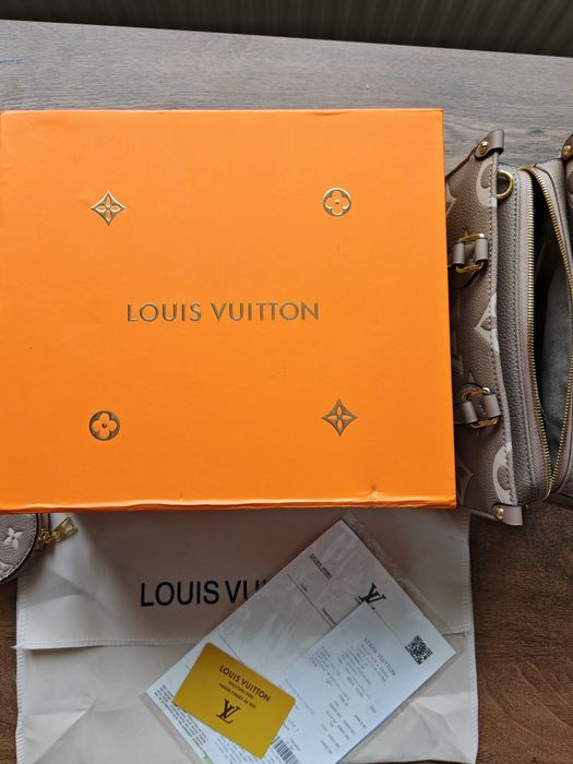 Geantă Louis Vuitton OnTheGo PM