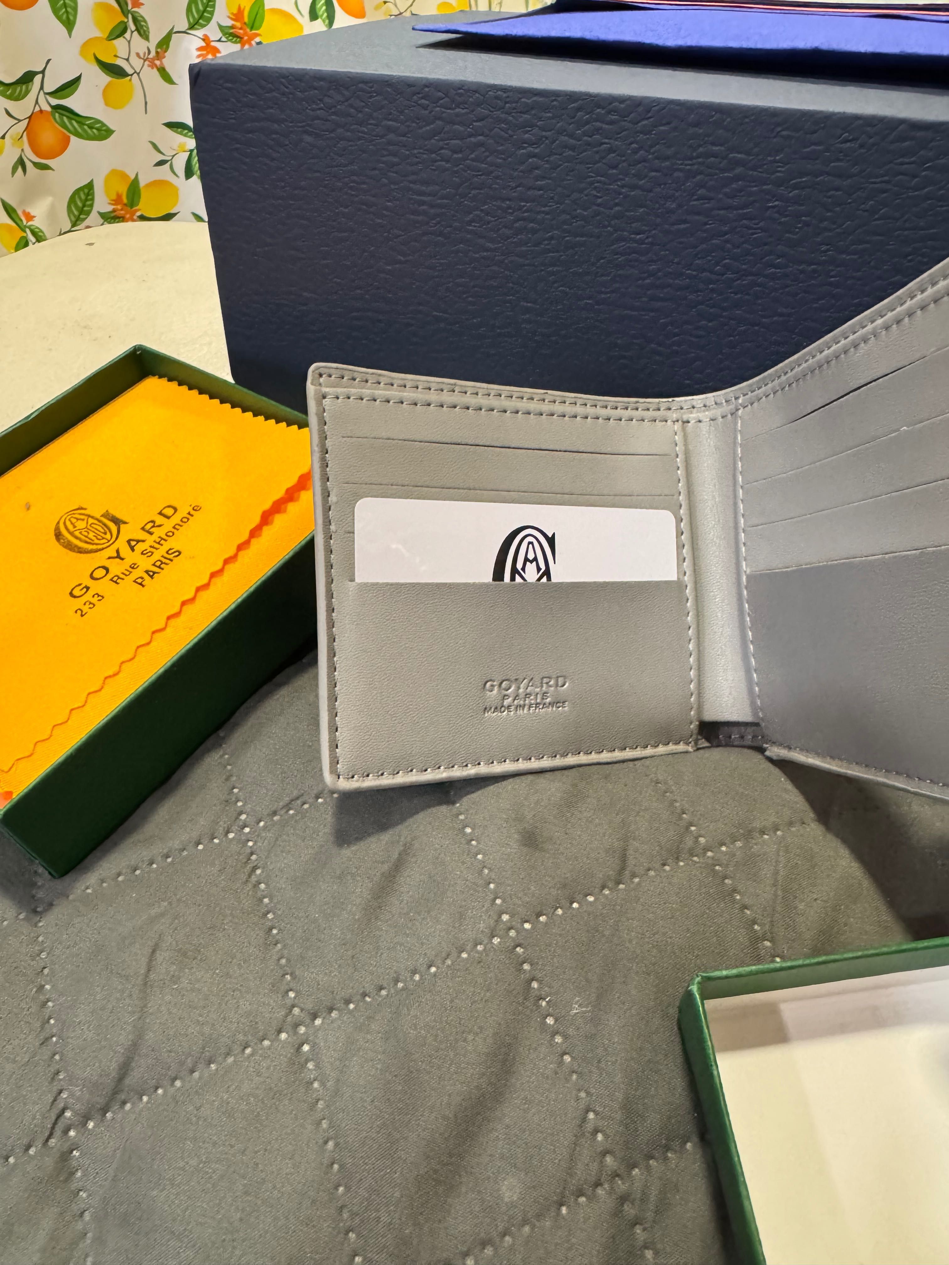 Портфейли Goyard