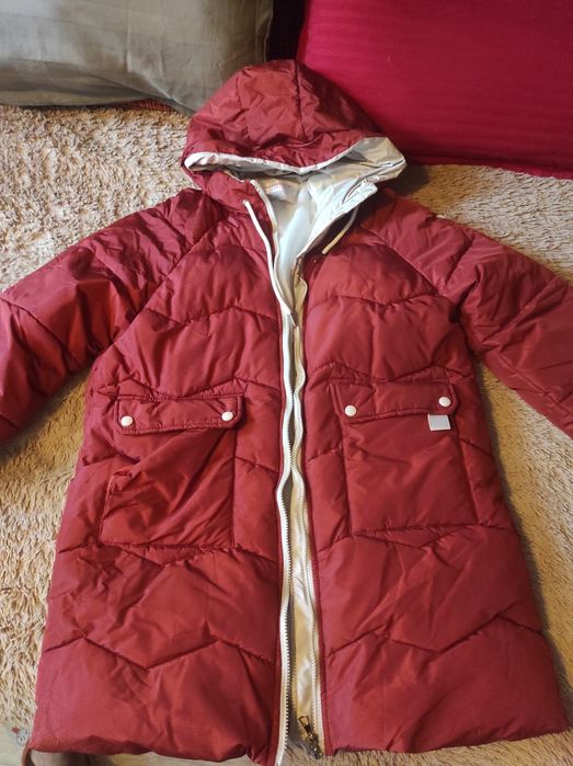 Куртка б/у в отличном состоянии