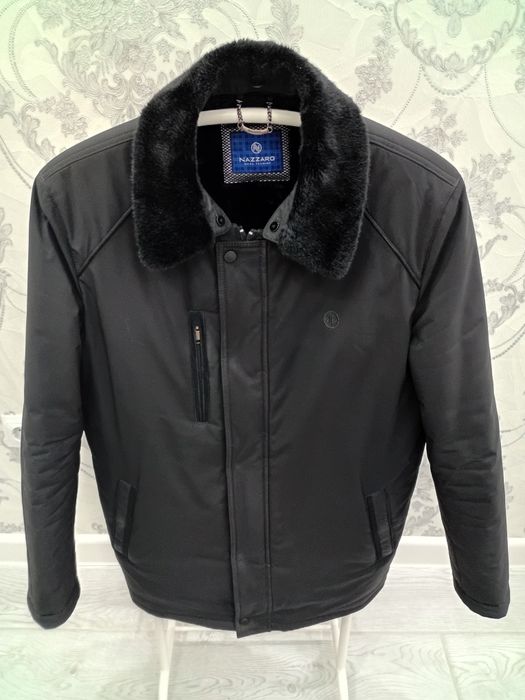 Продам почти новую зимнию куртку 52-размера