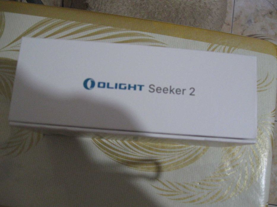Lanterna Olight Seeker 2,noua