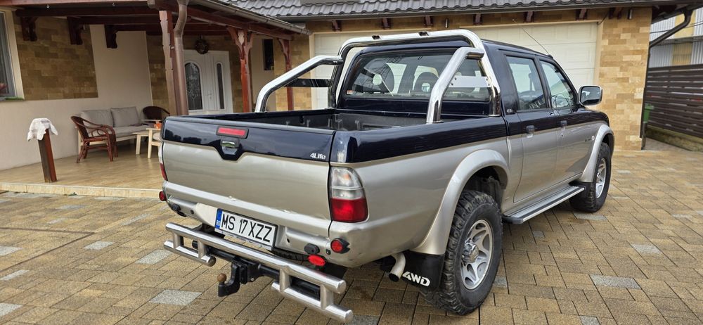 Mitsubishi L200 din 2005 volan pe dreapta 116 cp