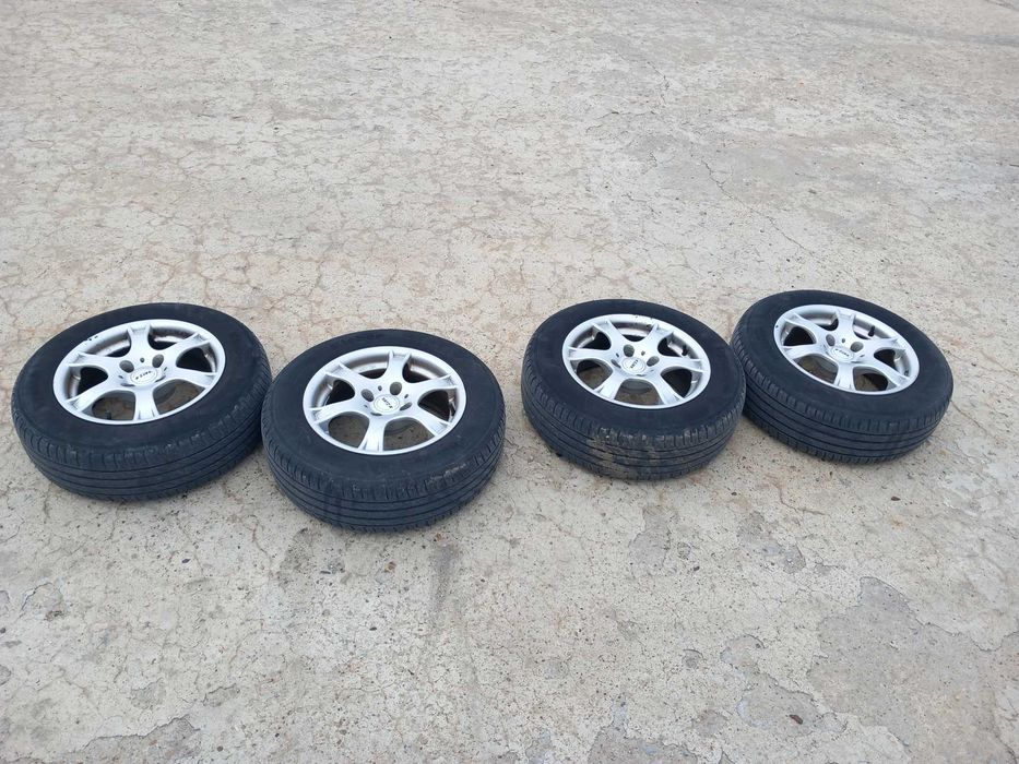 Джанти с гуми 15 цола 4 болта за Пежо , Ситроен
