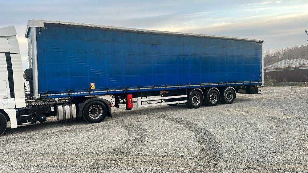 Semiremorca cu prelata Fruehauf