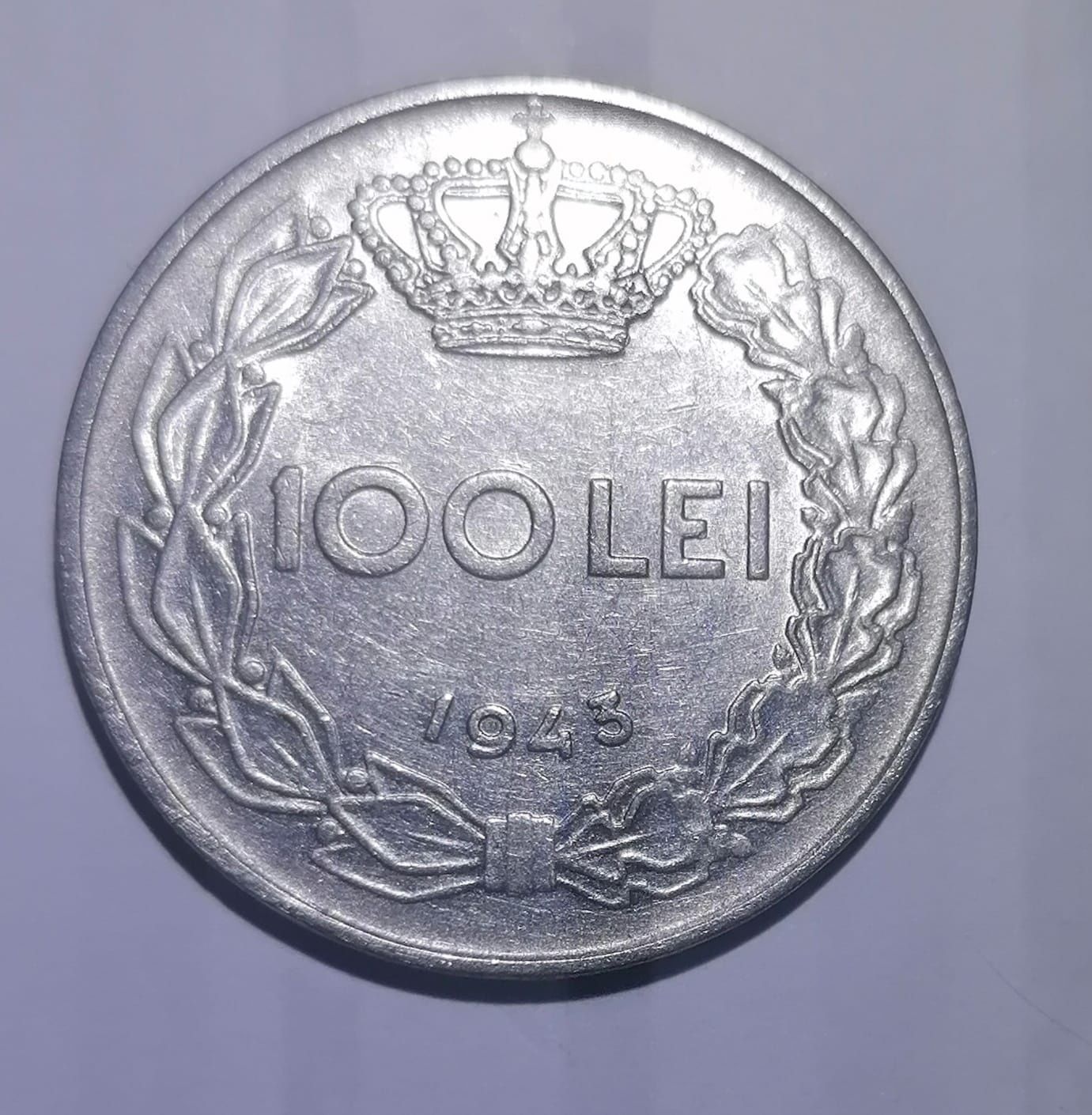 Vând moneda 100 lei din 1943