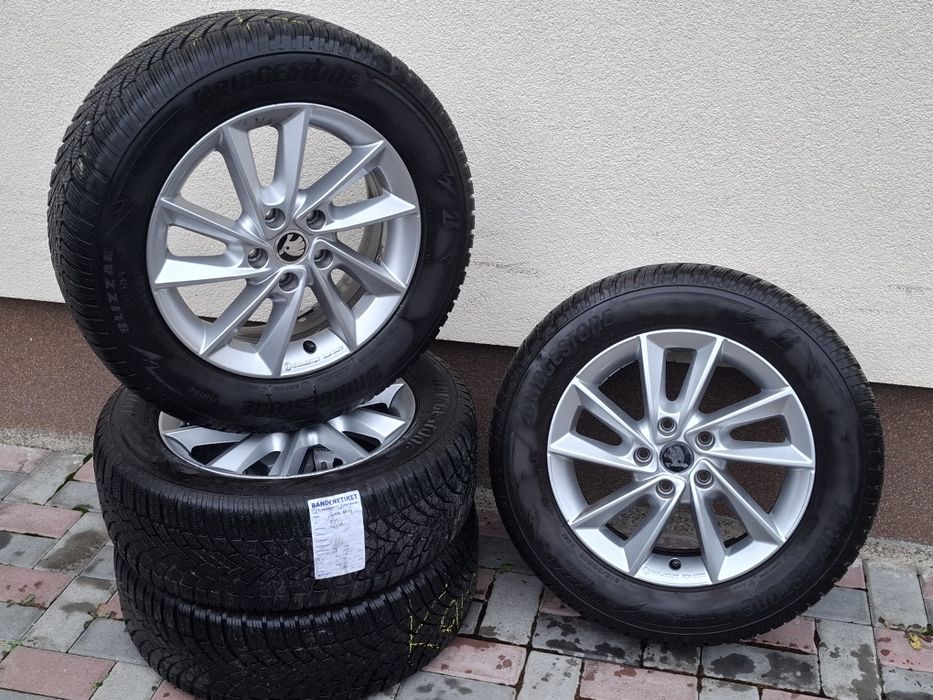 Set jante  aliaj cu anvelope de iarna 215 60 16 bridgestone 5x112 r16