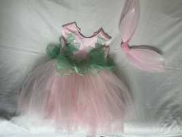 Розовое платье с крылями
