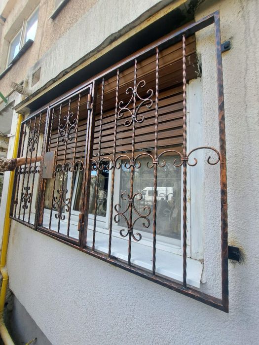 Gratii geamuri fier forjat