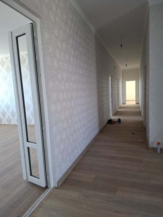 Urganch 5-yo'li Nadmes ko'prik yonida yangi qurilgan bino kavartira