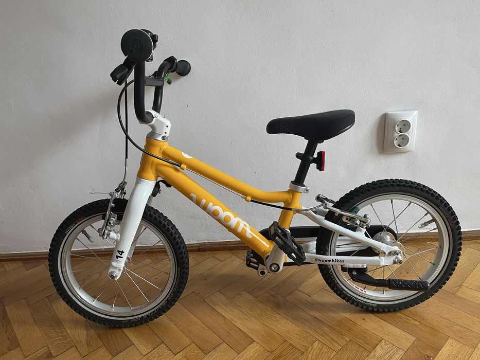 Bicicleta Woom 2 galben - stare foarte buna - cu cric si clopotel