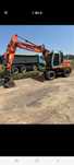 Vand excavator pneu 18 t motor iveco sau schimb cu exc senile