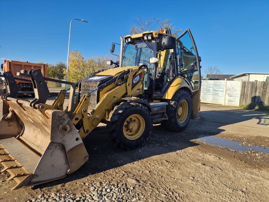 Vand buldoexcavator  cat caterpillar 428F fara ad blue
