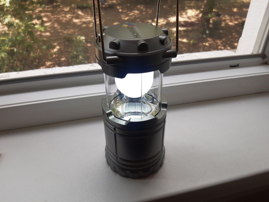 Два броя  фенери и трион  за рязане на  клони.