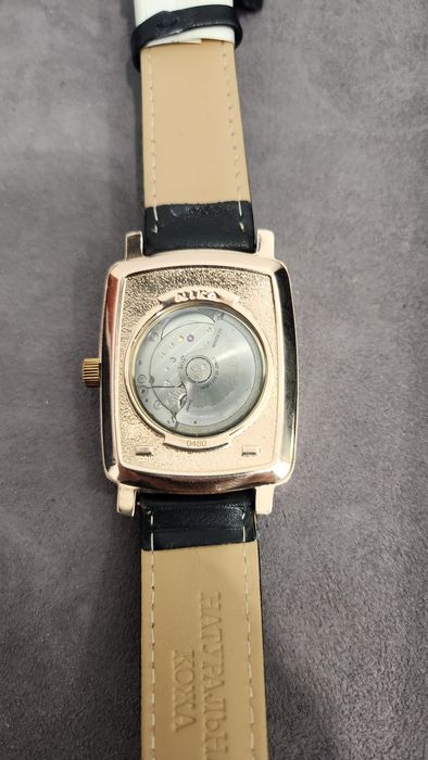 Золотые часы Ника