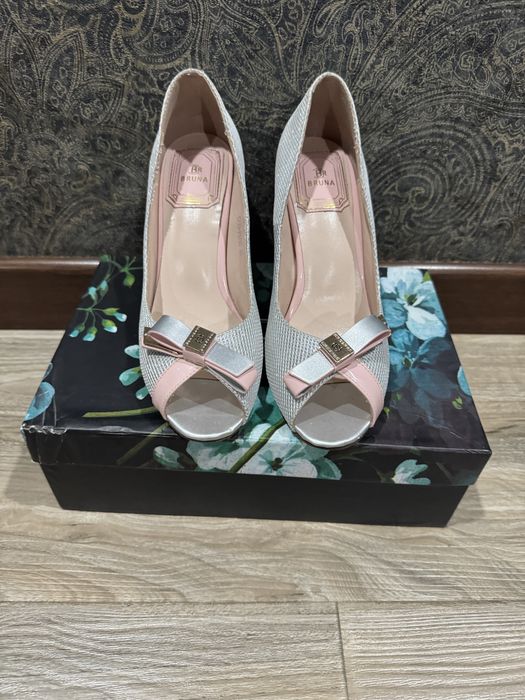 Tufli bruna brendiniki 1 marta kiyilganp