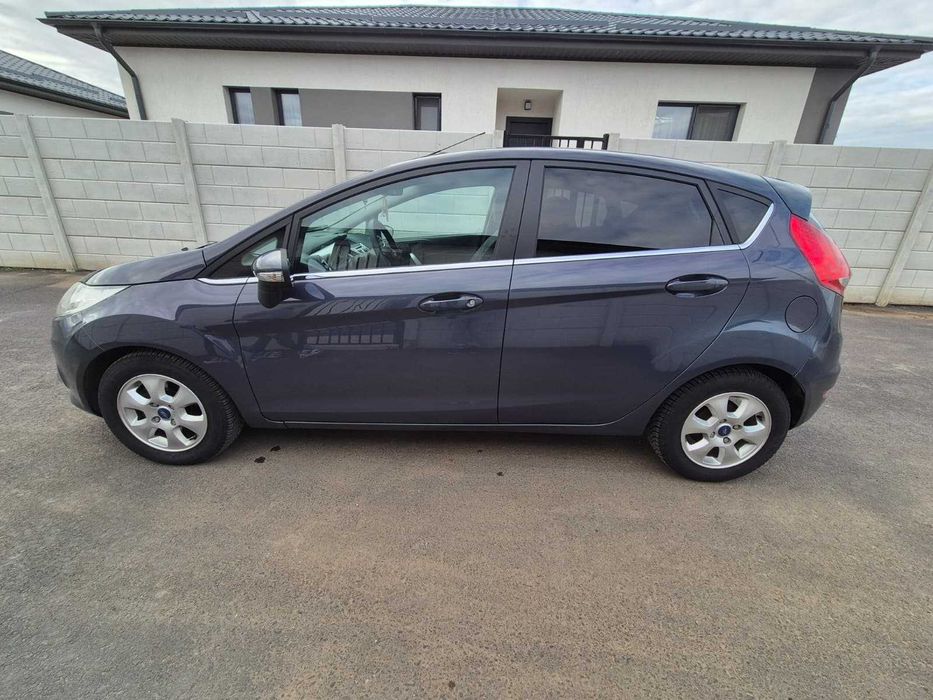 Ford Fiesta, 4 usi, 1,6l, 2011, 96 cp