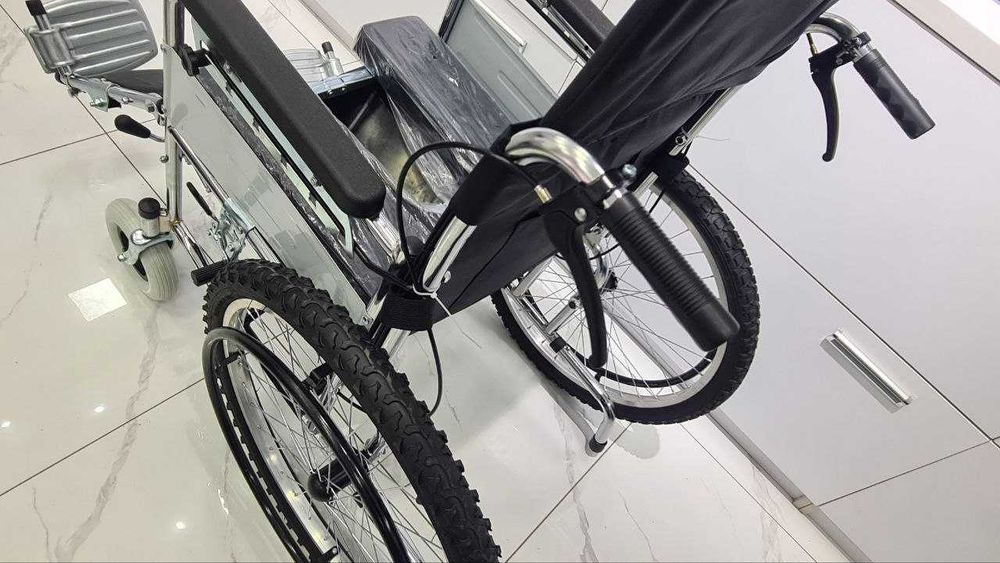 Ногиронлар аравачаси горшок билан