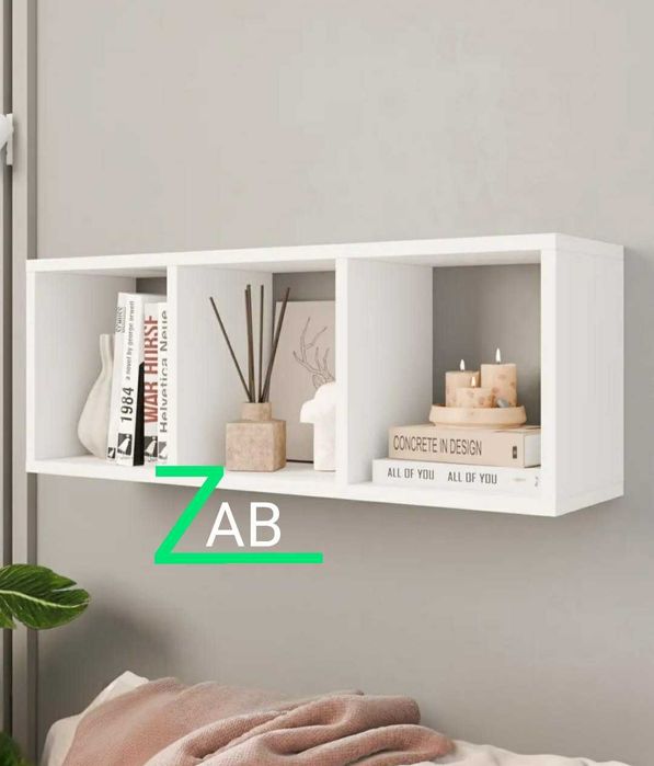 Навесная книжная полка удачное решение для гостиной и под телевизор.