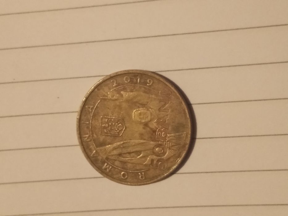 Vând moneda de la revoluția din 89