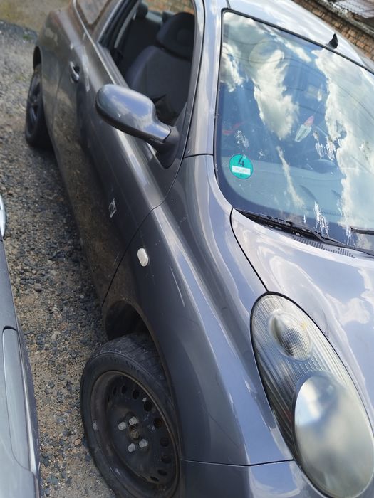 Aripa dreapta/stanga Nissan Micra K12 ( 2 usi ) an 2003-2010