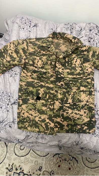 Камуфляж одеждав