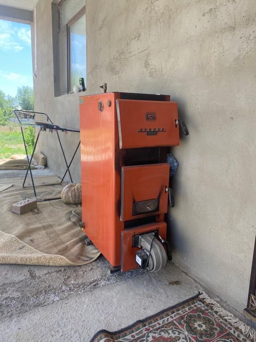 Котёл отопительный водогрейный “Куппер ПРО-28 (2.0)”