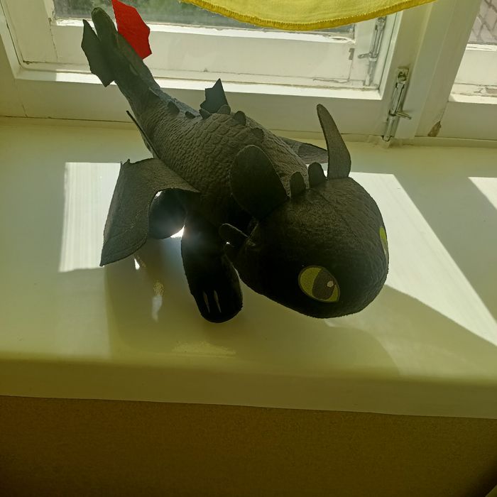 Игрушка в форме дракона