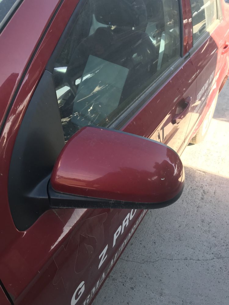 Oglinda stânga /dreapta Chevrolet Aveo an 2011