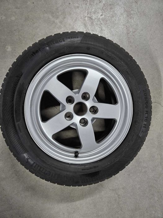 Cauciucuri iarnă Continental + capace Audi