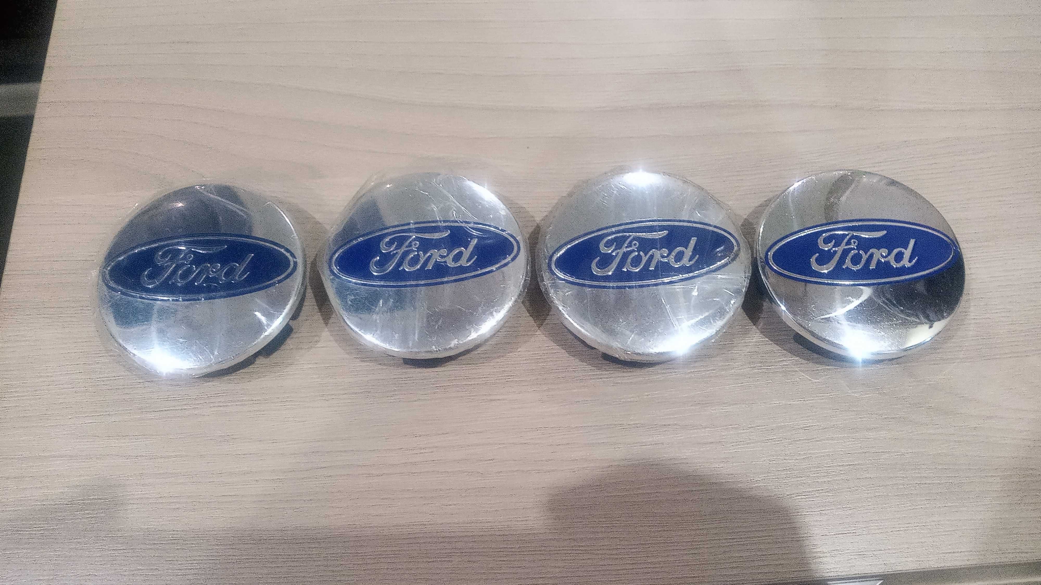 Продам колесные колпачки Ford